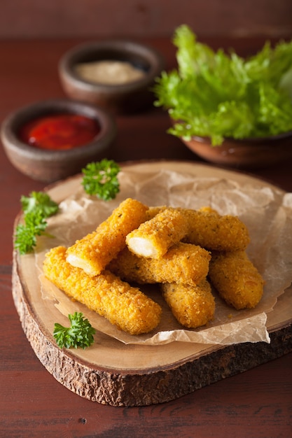 Mozzarella cheese sticks with ketchup