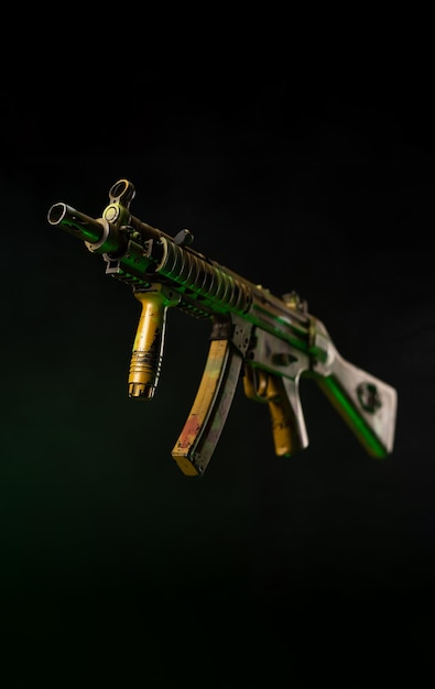 Mp5 automatic pistol isolated on a dark background in a color scheme