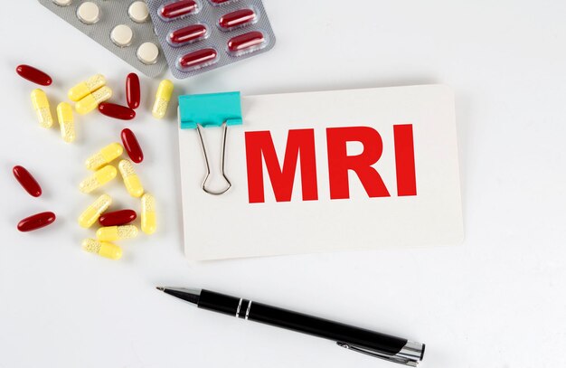 MRI text written in a card with pills Medical concept