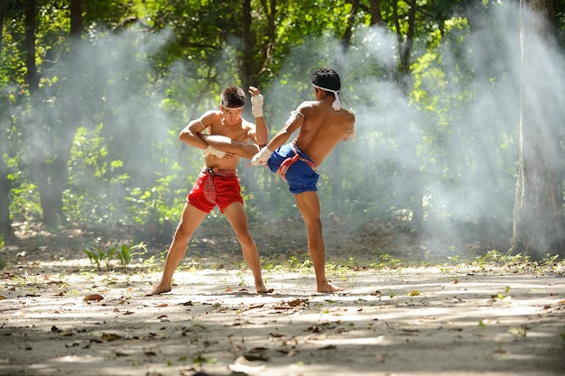 Photo muay thai fight boxing art and combat rope tied hand