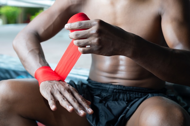 Muay Thai fighter wrapping his hands