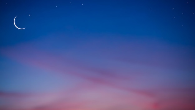 ムバラク ラマダン月 イスラム教徒 イスラム教 月のシンボル 三日月と夜空に星 夕暮れ オレンジ ピンク 青 夕方の背景 トワイライト イード・アル・アドハイード・アル・ファームハラム宗教のフリースペース