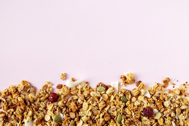 Muesli made of oat flakes hazelnuts pumpkin seeds coconut chips dried berries a copy of the space