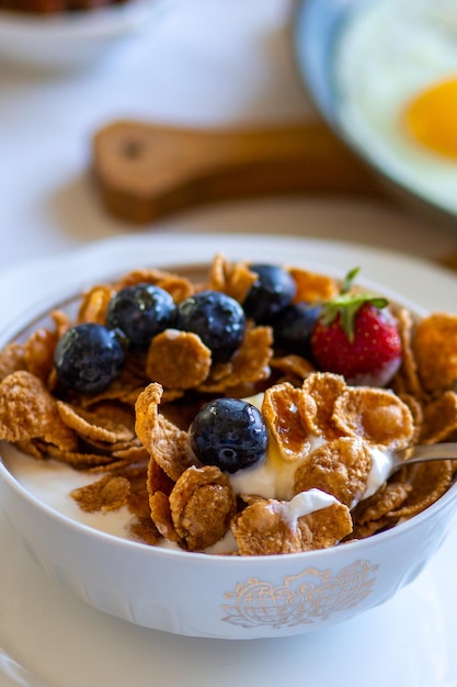 Muesli with honey and berries Beautiful tasty breakfast Breakfast on the table Dinner food day