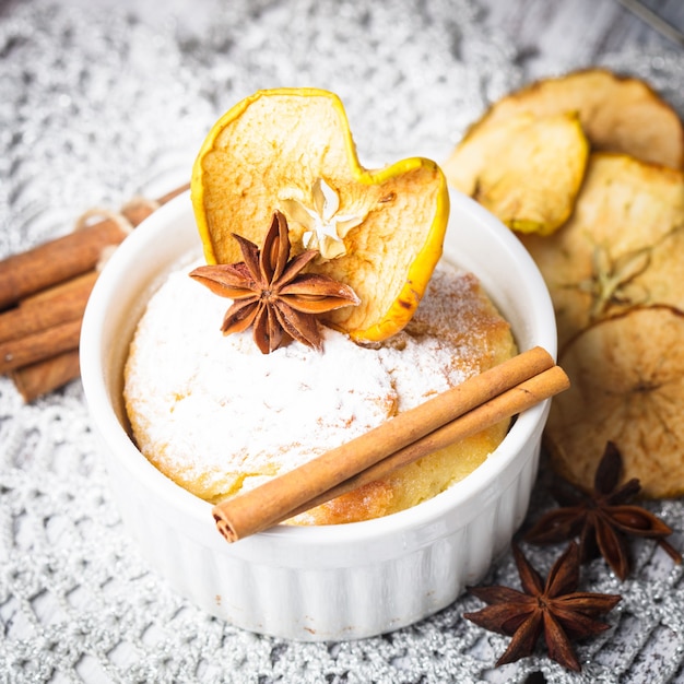 Muffin with apple and cinnamon, decorated with anise star