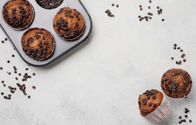 Muffins on baking tray and muffins frame