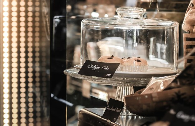 Photo muffins on stand in cafe