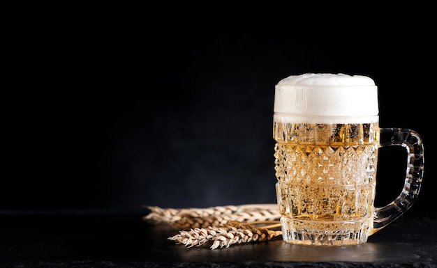 Mug beer on a black background