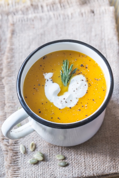 Mug of pumpkin cream soup