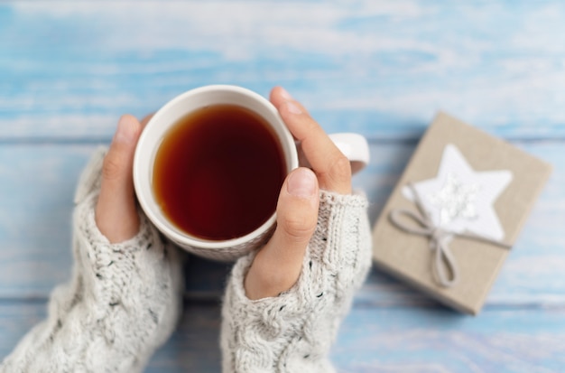 Mug of tea and presents