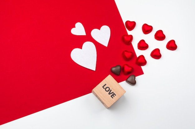 Mug with chocolate hearts. Flat lay composition. Romantic, St Valentines Day concept