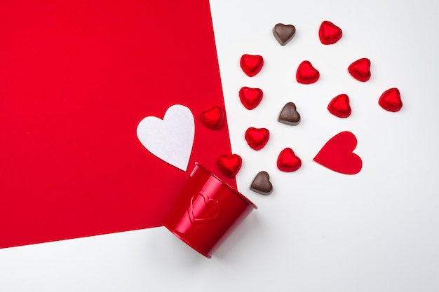 Mug with chocolate hearts. Flat lay composition. Romantic, St Valentines Day concept