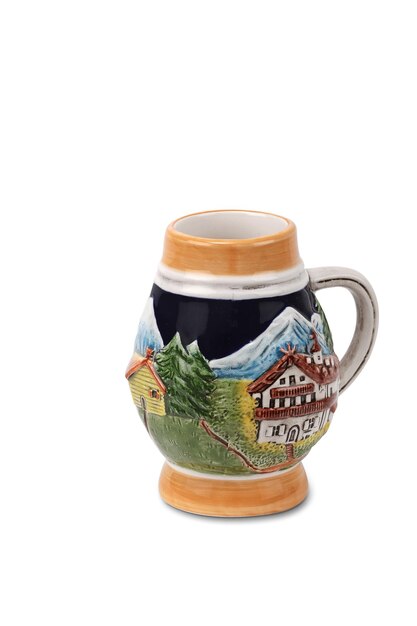 A mug with a mountain scene on the front