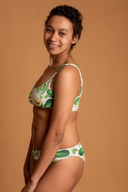 Mulatto girl in lingerie posing. Body positive.