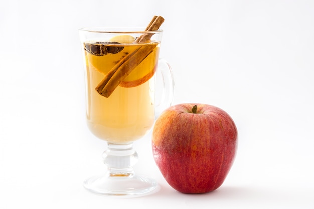 mulled cider in glass isolated on white background top view