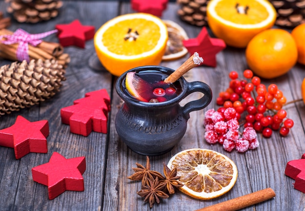 Mulled wine in a brown ceramic mug 