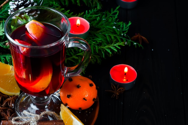 Mulled wine for Christmas Eve celebration party by tree.