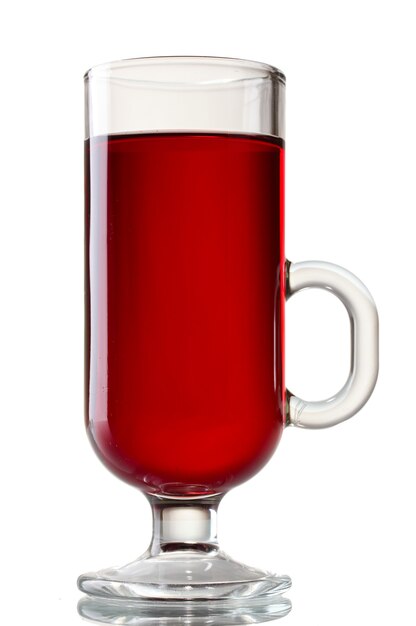 Mulled wine in the glass isolated on white surface