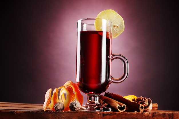 Mulled wine in the glass, spice and lemon