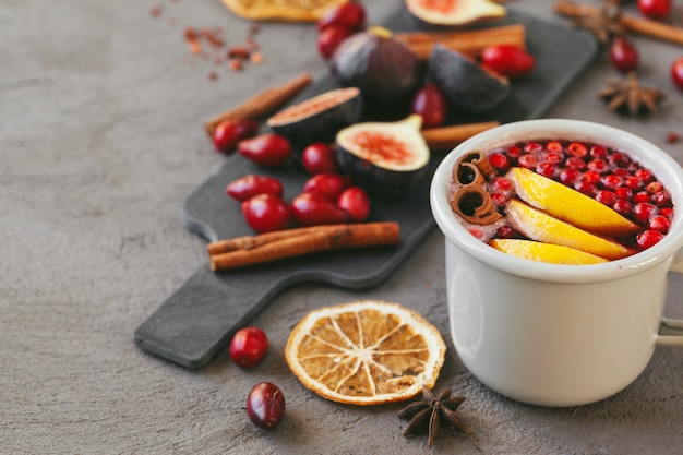 Mulled wine hot drink with fruit and spices