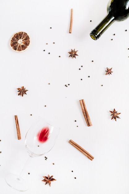 Mulled wine ingredients on white background. Flat lay, top view