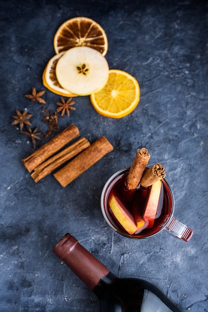 Mulled wine recipe ingredients on black chalkboard