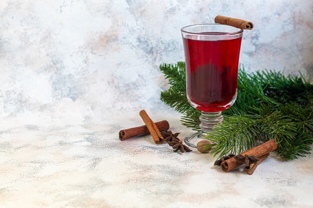 Mulled wine, a warming drink in a cup with spices