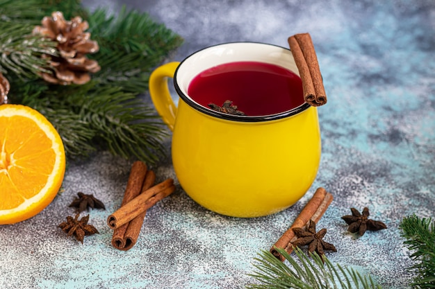 Mulled wine, a warming drink in a cup with spices