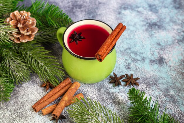 Mulled wine, a warming drink in a cup with spices