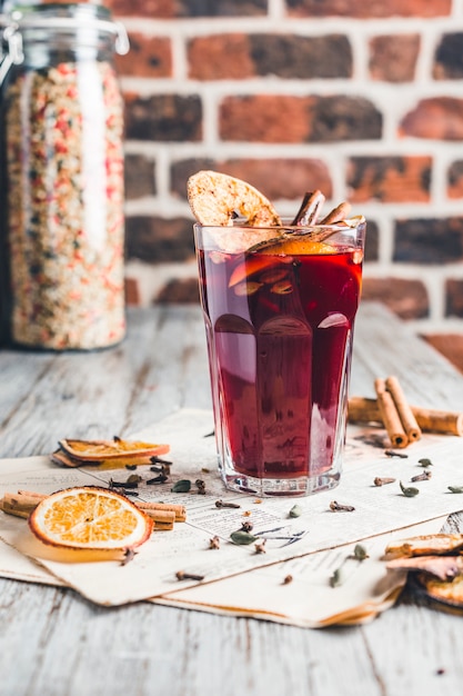 Mulled wine with cinnamon and sugar and dry fruits