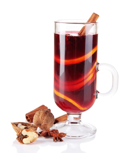 Mulled wine with nuts and spices isolated on white