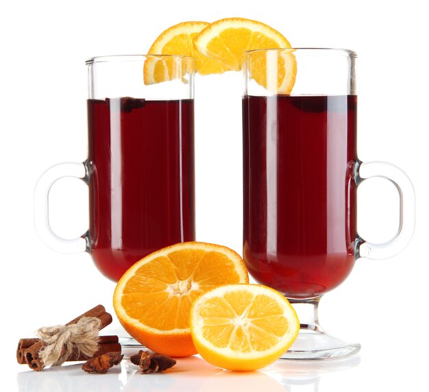 Mulled wine with oranges and spices isolated on white