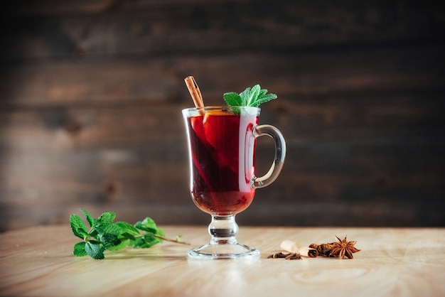 Mulled wine with slice of orange  spices. 