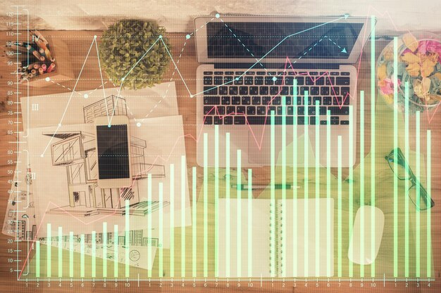 Foto multi blootstelling van financiële grafiek tekenen over tabelachtergrond met computer concept van onderzoek bovenaanzicht