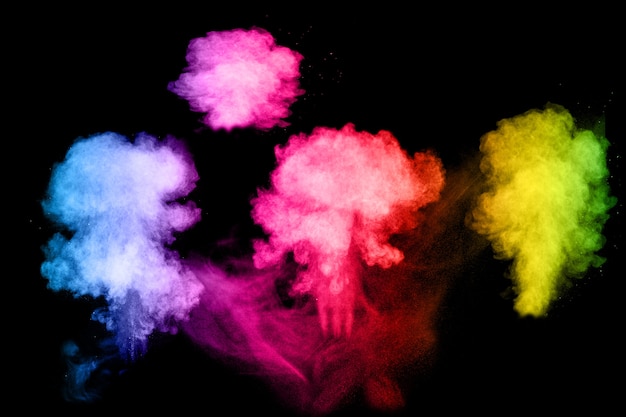 Foto esplosione di polvere di multi colore su sfondo nero