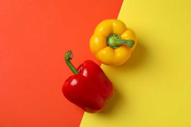 Multi-colored bell pepper on two tone background