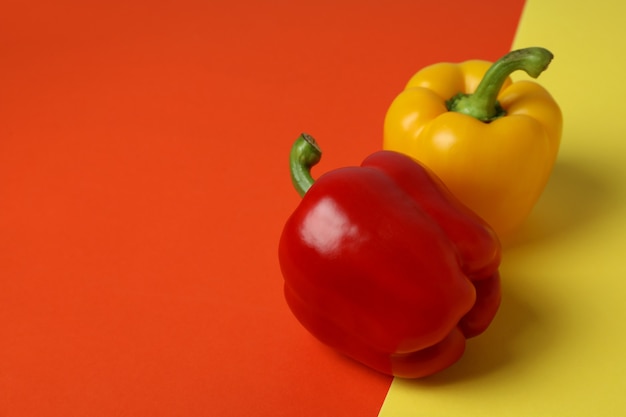 Multi-colored bell pepper on two tone background