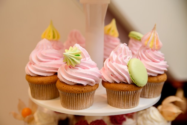 Multi-colored cream cup cakes