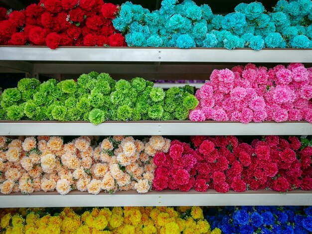 Multi colored flowers for sale in market