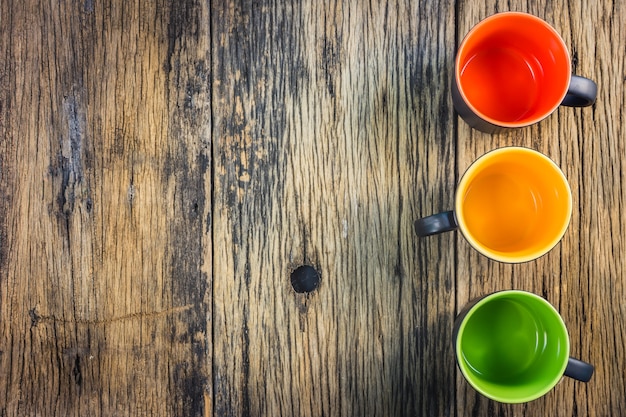 Multi-colored glass on old wooden table