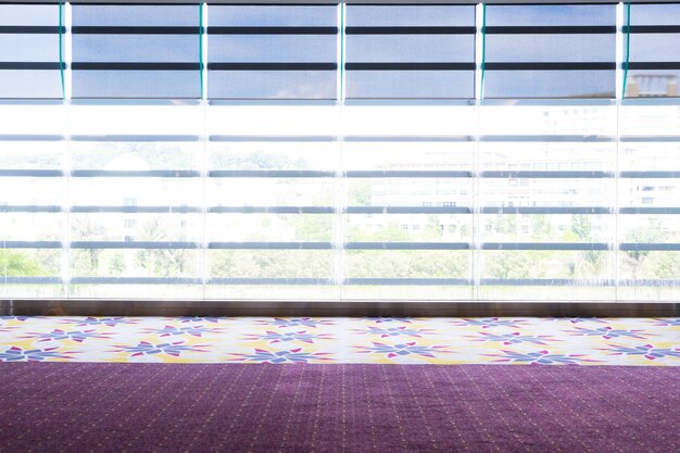 Photo multi colored glass window on tiled floor