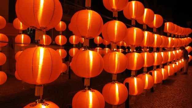 Multi colored lanterns for sale at night