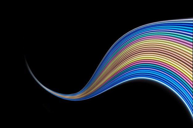 multi colored light painting against black background