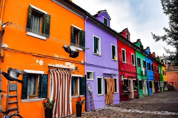 Photo multi colored residential buildings in city