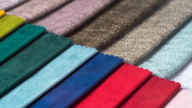 Multi colored set of upholstery fabric samples for selection collection of textile swatches
