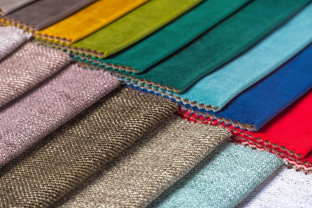 Multi colored set of upholstery fabric samples for selection collection of textile swatches