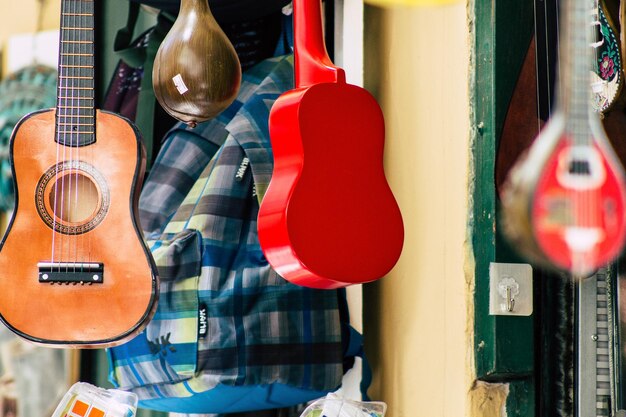 Multi colored shoes for sale at market stall