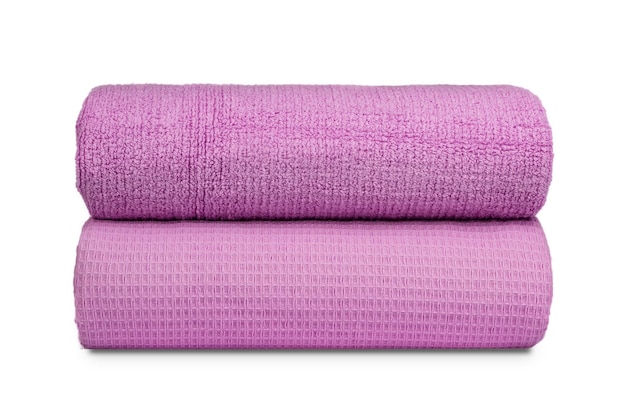 multi-colored terry towels rolled up and laid out in a row on the table