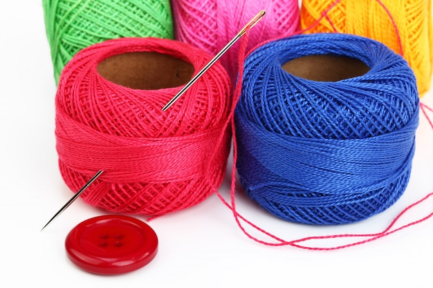 Multi-colored threads for sewing in a composition on a white space