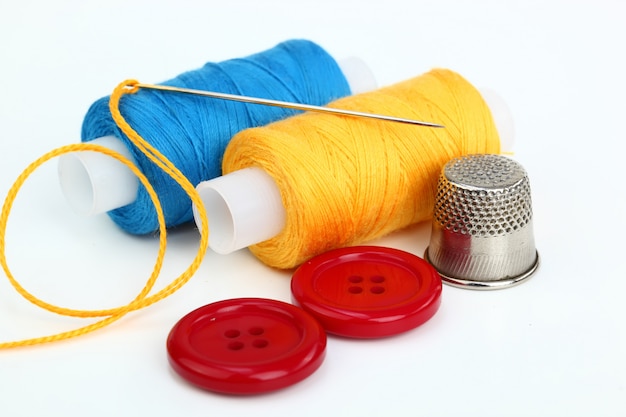 Multi-colored threads for sewing in a composition on a white space